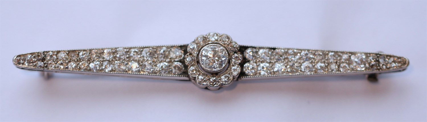 Lot 1 - A diamond set bar brooch