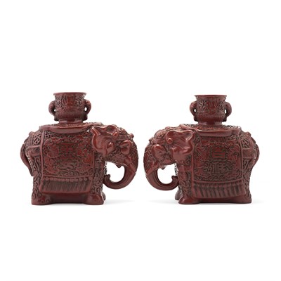 Lot 90 - PAIR OF CHINESE CINNABAR LACQUER ELEPHANTS