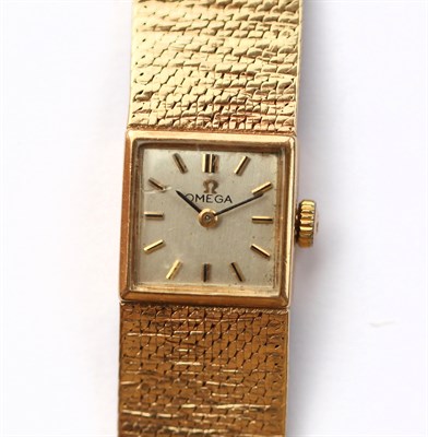 Lot 361 - OMEGA - a 1960's lady's 9ct gold wrist watch