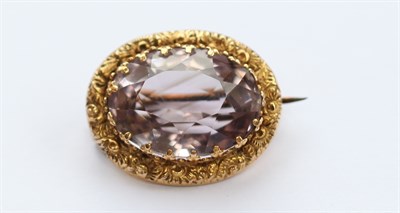Lot 377 - A Victorian 9ct gold mounted amethyst set brooch