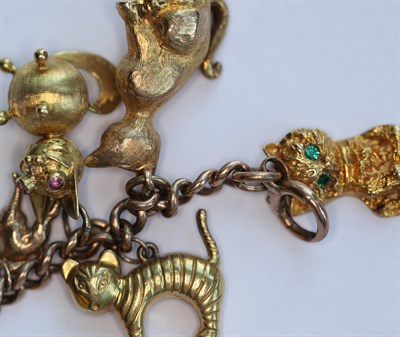 Lot 130 - A 9ct gold charm bracelet