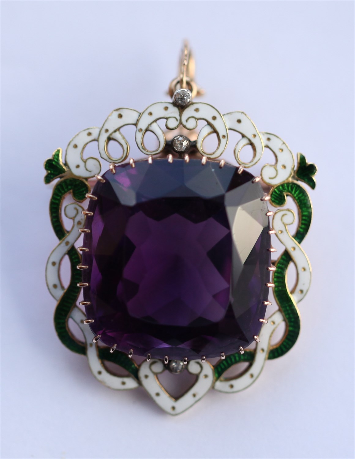 Lot 49 - SUFFRAGETTE INTEREST - A gold and enamelled amethyst pendant
