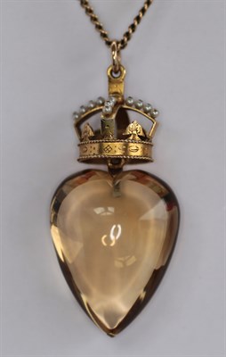 Lot 338 - A citrine and seed pearl set pendant