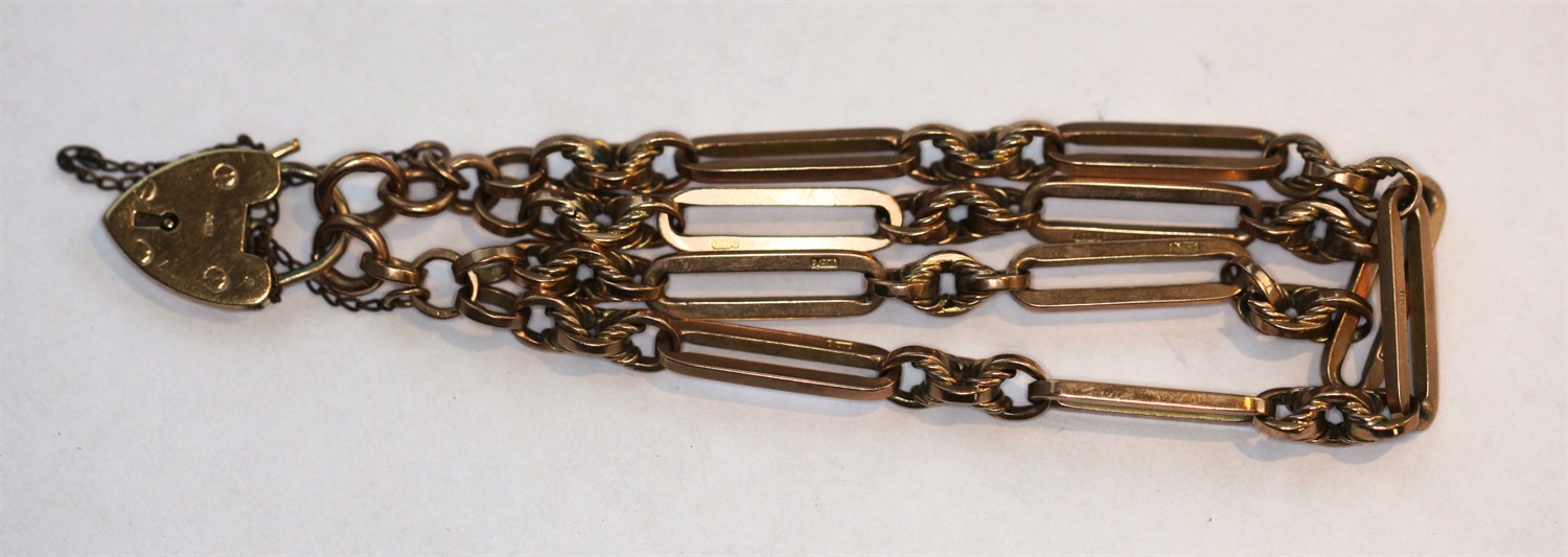 Lot 147 - A linked bracelet with padlock