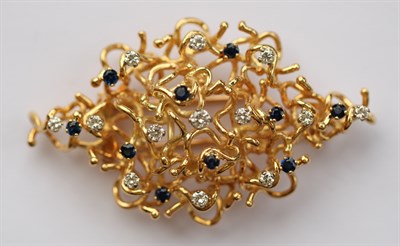 Lot 335 - A mid-20th century sapphire and diamond set brooch/pendant