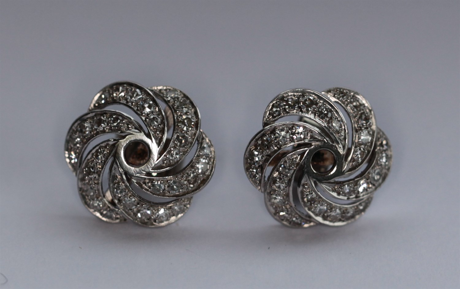 Lot 175 - A pair of diamond set earrings