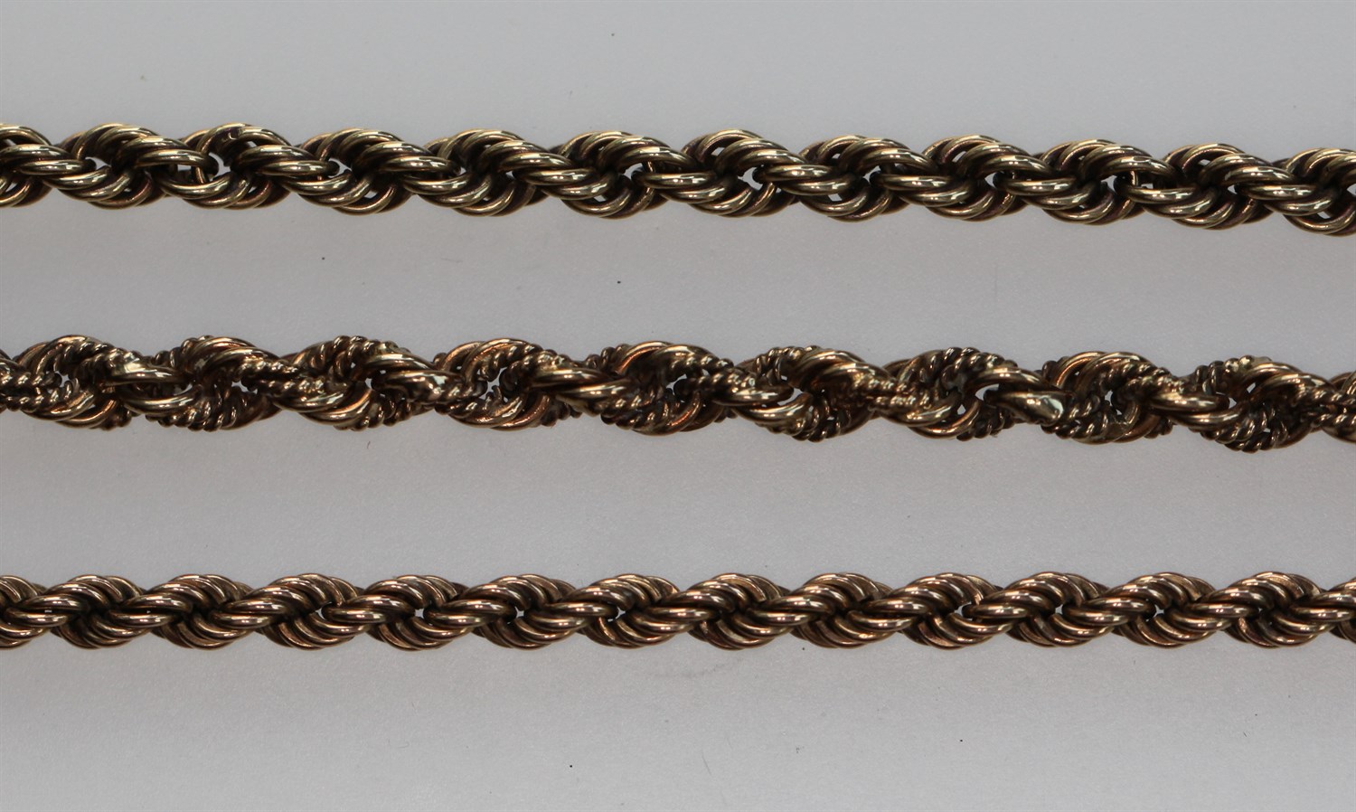 Lot 138 - Three 9ct gold assorted ropetwist link necklaces