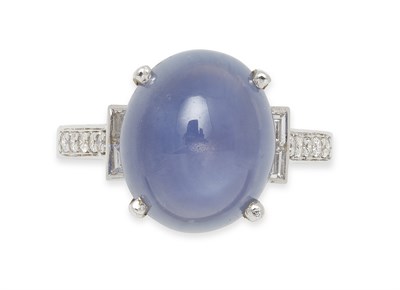Lot 318 - An 18ct white gold mounted synthetic star sapphire and diamond set ring