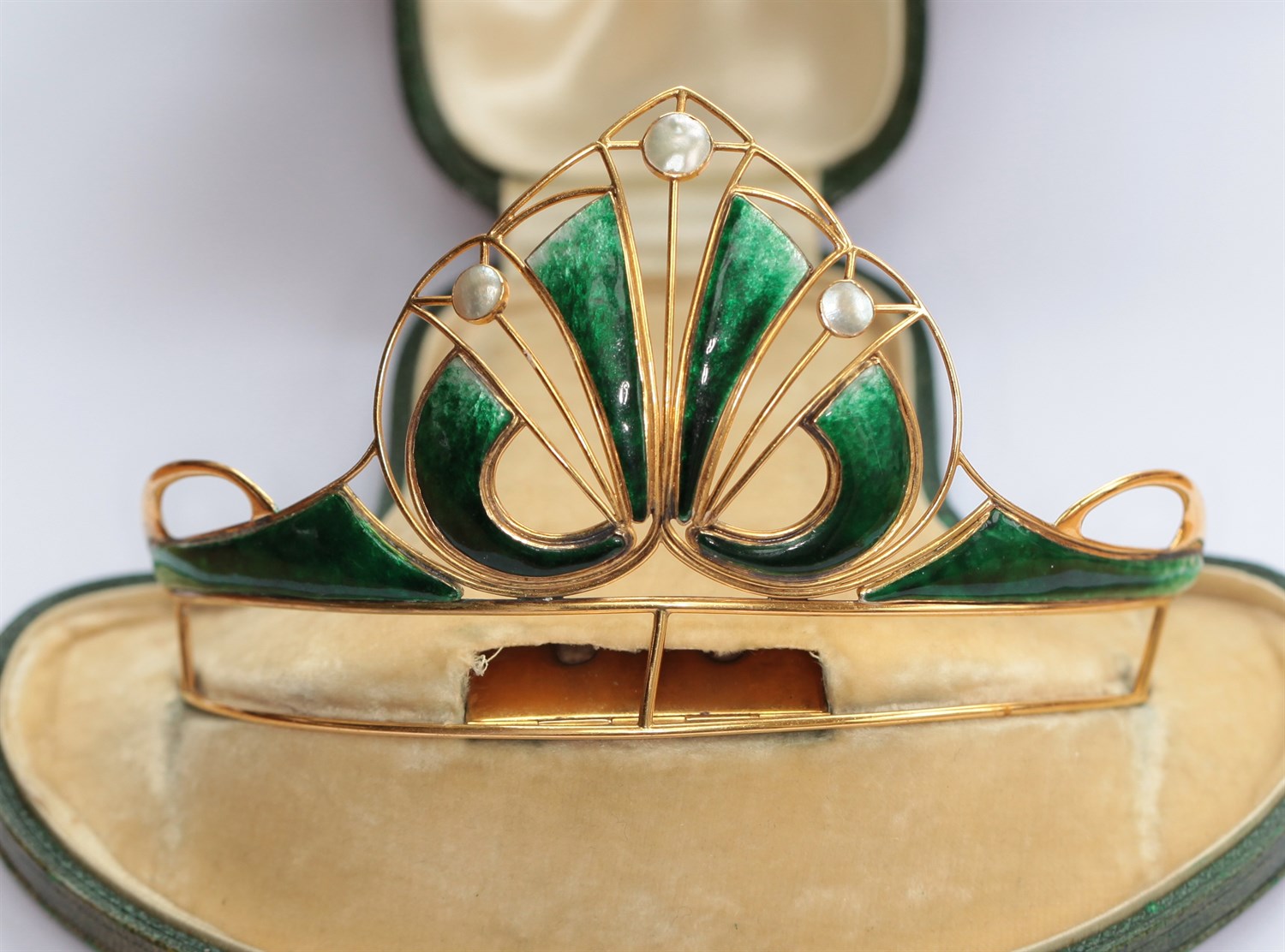 Lot 35 - An early 20th century Scottish green enamel and blister pearl set tiara