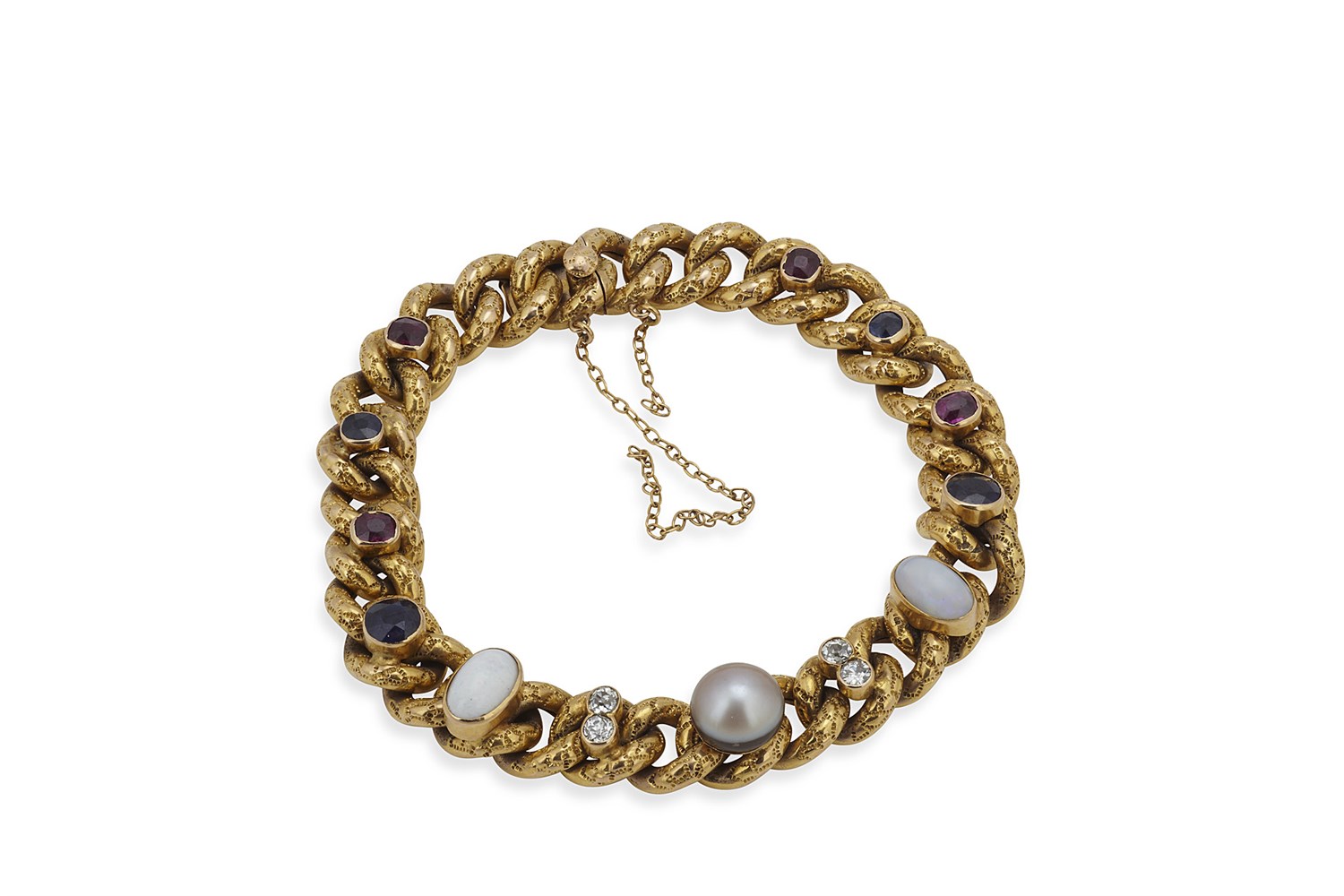Lot 13 - A Edwardian multi-gem set gold bracelet