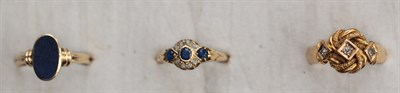 Lot 450 - A group of three gem-set rings