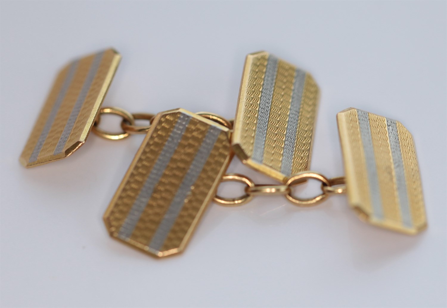 Lot 91 - A pair of early 20th century 18ct gold and platinum cufflinks