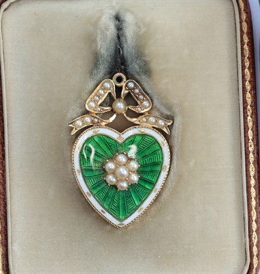 Lot 41 - An early 20th century gold and gem set pendant