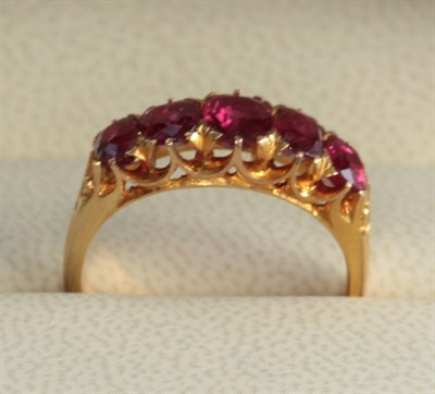 Lot 60 - A group of various gem set rings to include
