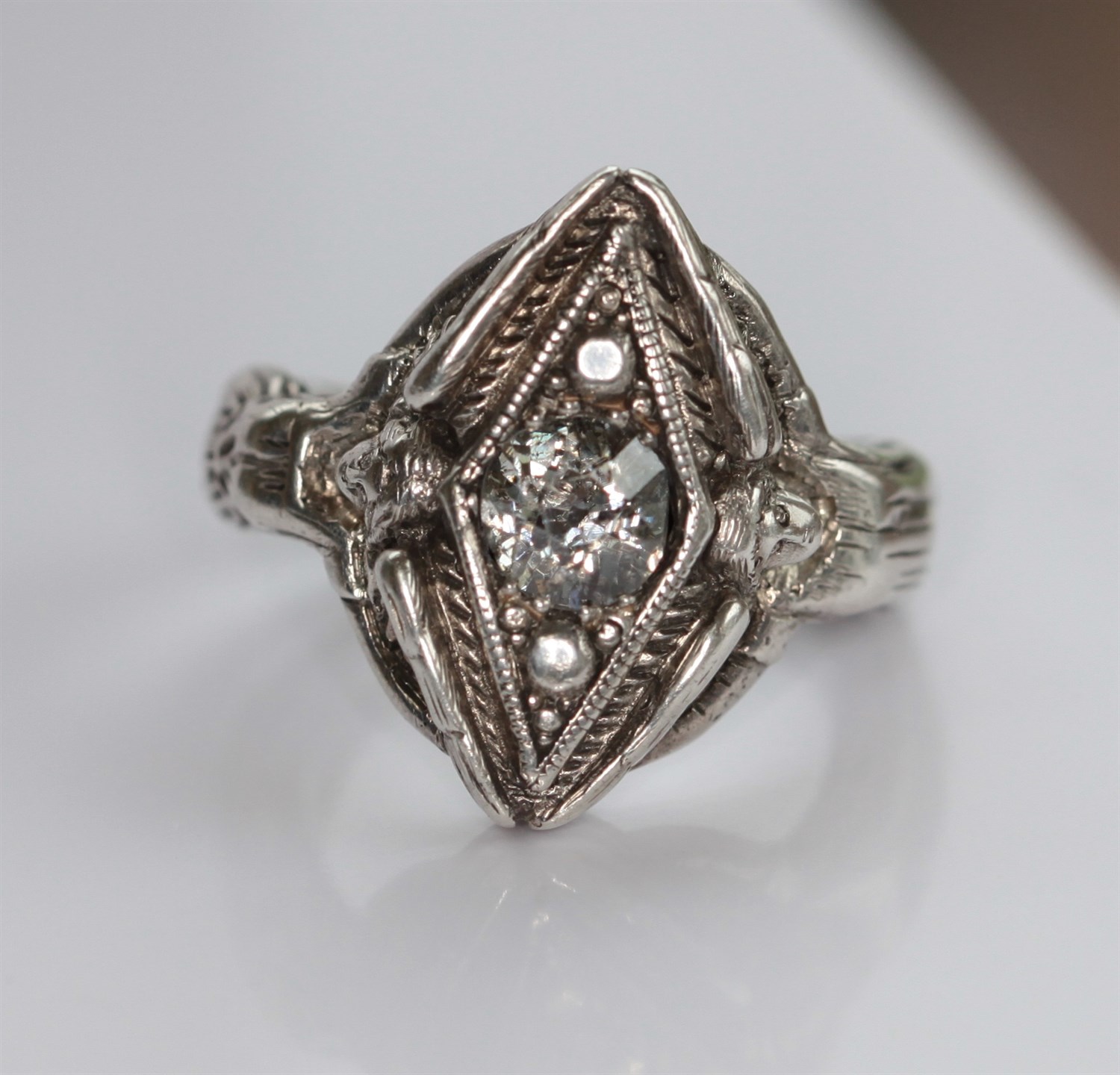 Lot 252 - OMAR RAMSDEN - a diamond set silver ring