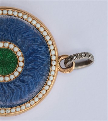 Lot 249 - CARTIER - a gold and enamel locket