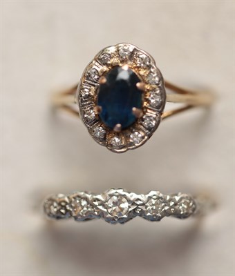 Lot 395 - A five stone diamond ring