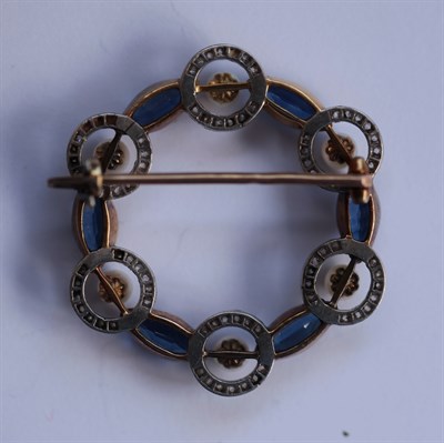 Lot 341 - A sapphire and pearl set brooch