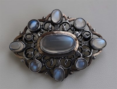 Lot 289 - SYBIL DUNLOP - a silver mounted moonstone set brooch