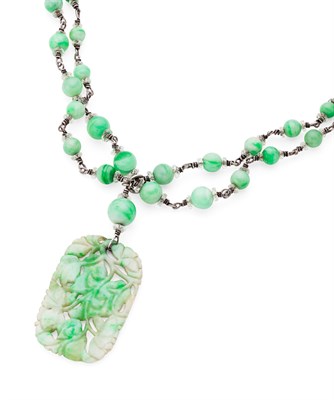 Lot 229 - A carved jadeite necklace