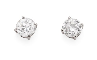 Lot 204 - A matched pair of diamond set ear-studs