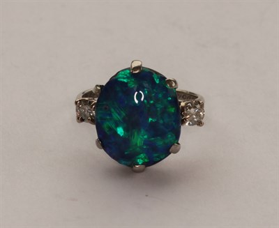 Lot 266 - An opal and diamond set ring
