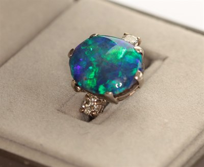 Lot 266 - An opal and diamond set ring