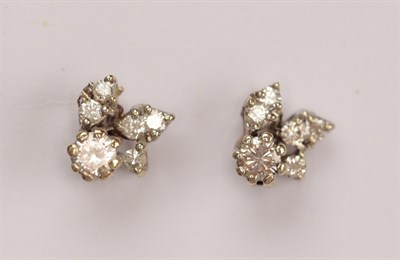 Lot 223 - A pair of diamond cluster earrings