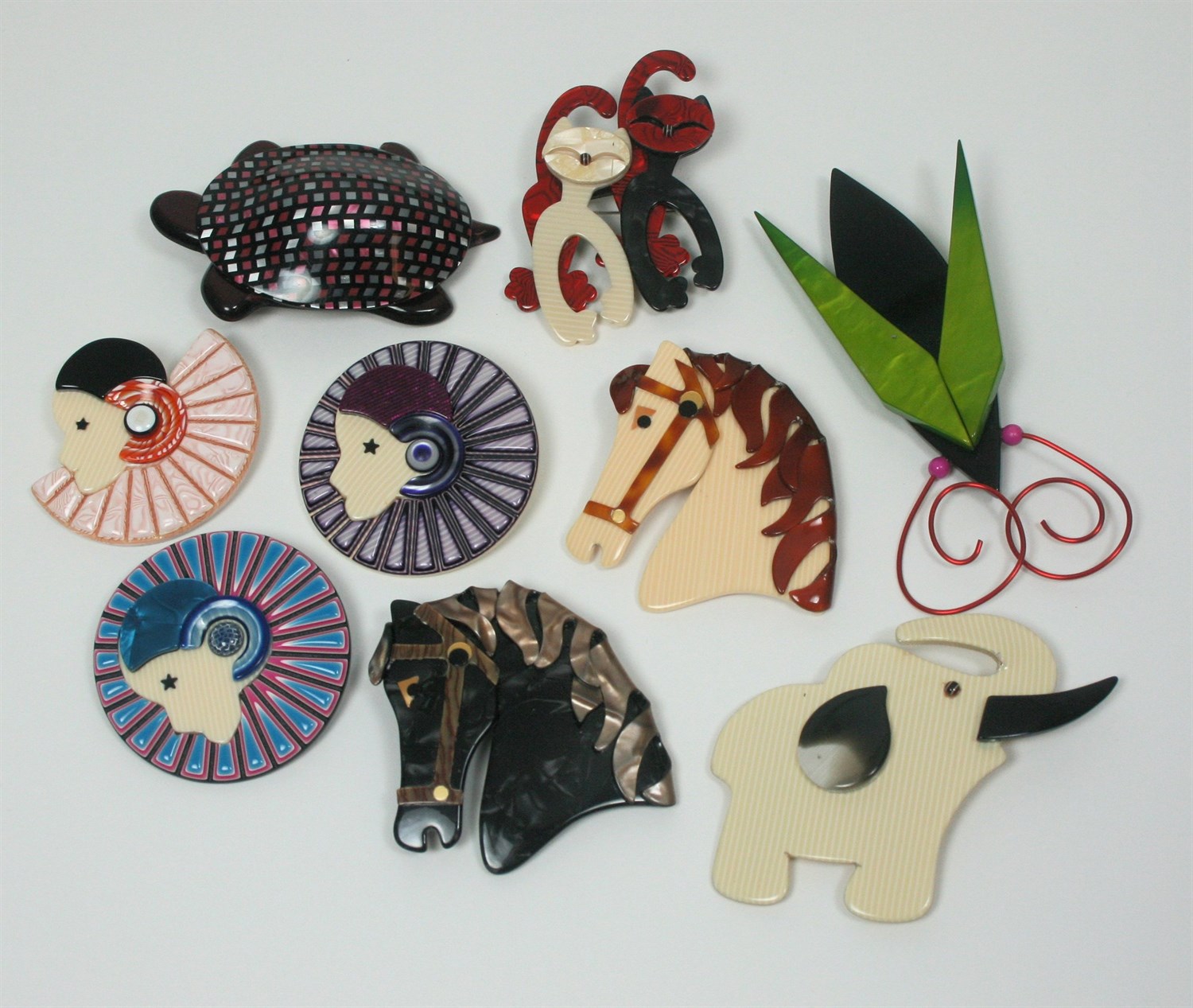 Lot 45 - LEA STEIN - A collection of brooches
