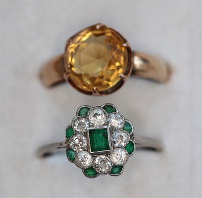 Lot 380 - An attractive emerald and diamond ring