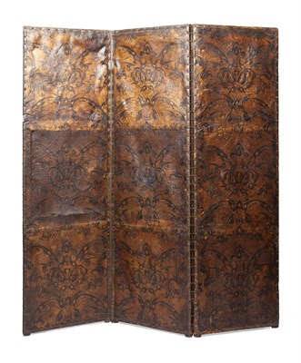 Lot 97 - SPANISH GILT AND POLYCHROMED LEATHER THREE FOLD SCREEN