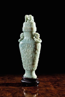 Lot 195 - A LARGE ARCHAIC STYLE PALE GREEN JADEITE VASE AND COVER