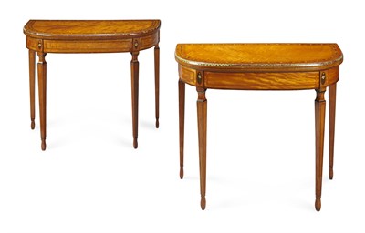 Lot 54 - PAIR OF PAINTED SATINWOOD AND KINGWOOD FOLDOVER GAMES TABLES
