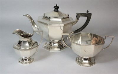 Lot 250 - A modern three piece tea set