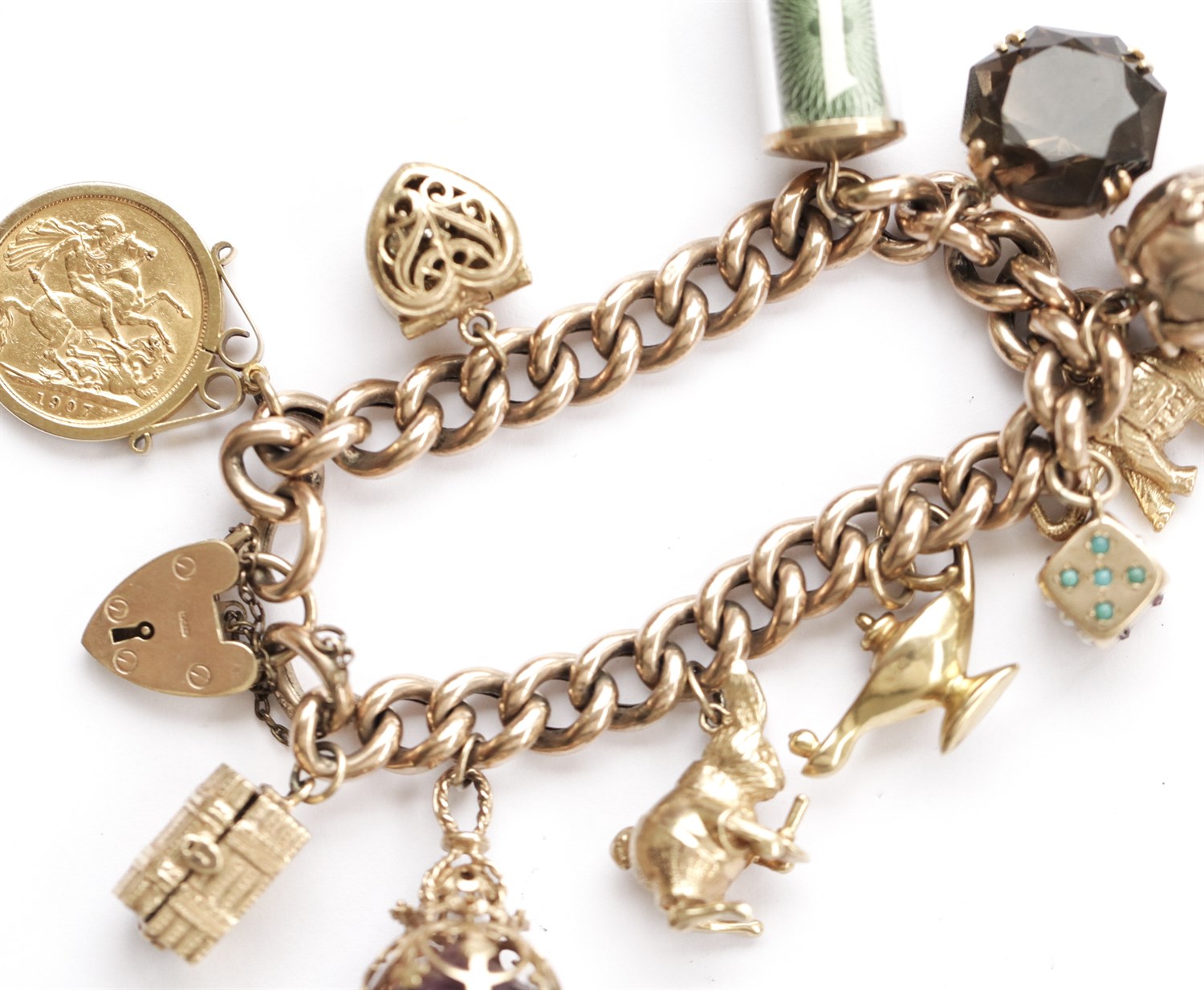 Lot 70 - A 9ct gold charm bracelet