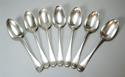 Lot 340 - A set of seven George III table spoons