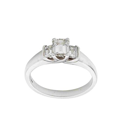 Lot 20 - A modern platinum set three stone diamond ring