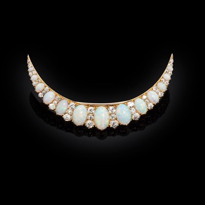 Lot 170 - An early 20th century opal and diamond set crescent brooch