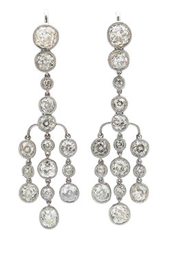 Lot 31 - A pair of diamond pendant earrings