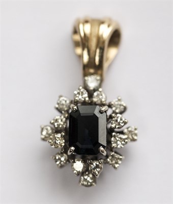 Lot 42 - A sapphire and diamond cluster pendant
