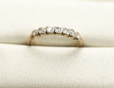 Lot 93 - A modern 18ct gold mounted diamond half eternity ring