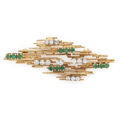 Lot 161 - A 1970's Modernist 18ct gold mounted emerald and diamond set brooch