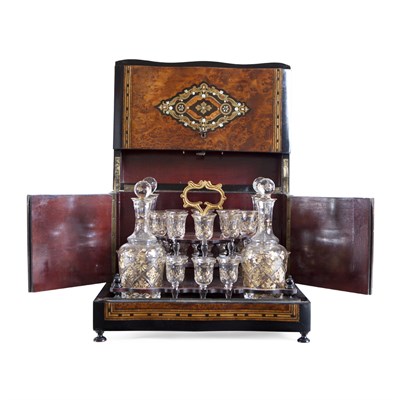 Lot 73 - A FRENCH AMBOYNA AND BRASS MOUNTED DECANTER STAND