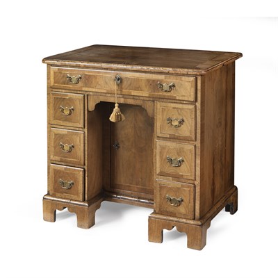 Lot 106 - A GEORGE I WALNUT AND FEATHER BANDED KNEEHOLE DESK