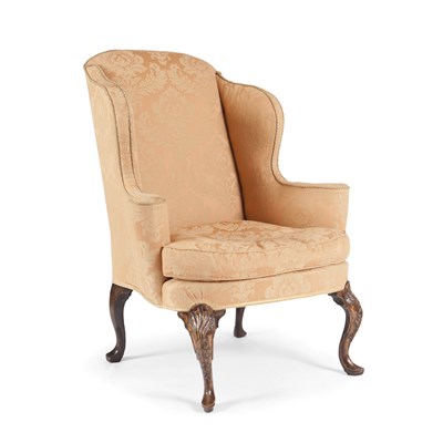 Lot 120 - A QUEEN ANNE WALNUT FRAMED AND UPHOLSTERED WING ARMCHAIR