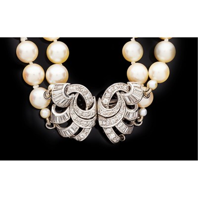 Lot 4 - A two-row cultured pearl necklace with diamond clasp