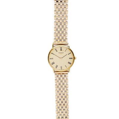 Lot 80 - LONGINES - A gentleman's 9ct gold wrist watch