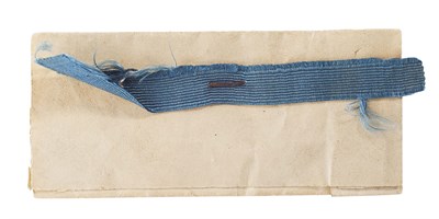Lot 16 - A fragment of blue silk garter