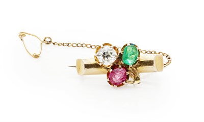 Lot 16 - A diamond, emerald and ruby set brooch