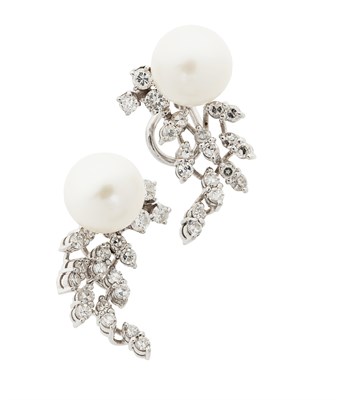 Lot 146 - A pair of diamond and pearl earrings